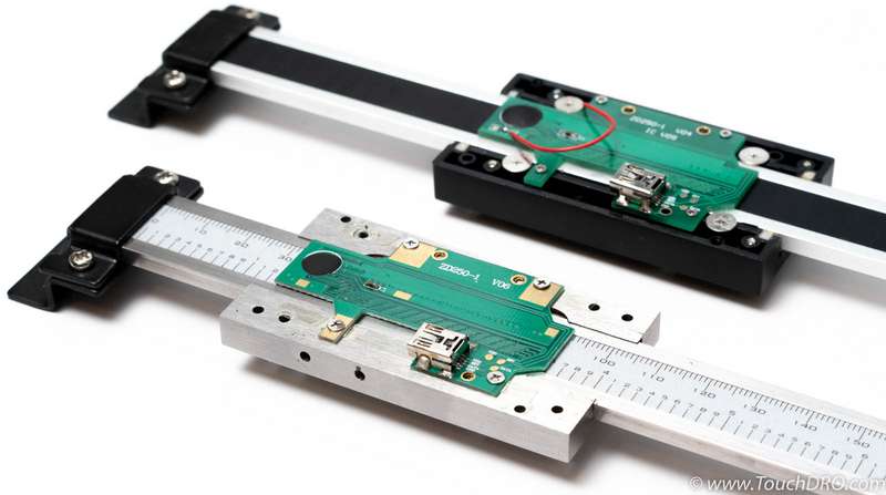 Aluminum and stainless steel scale side by side